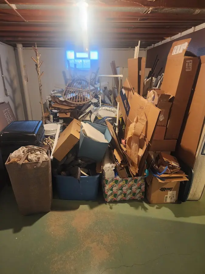 Roll-off dumpster container at job site for Concrete Dumpster Rental in Fitchburg